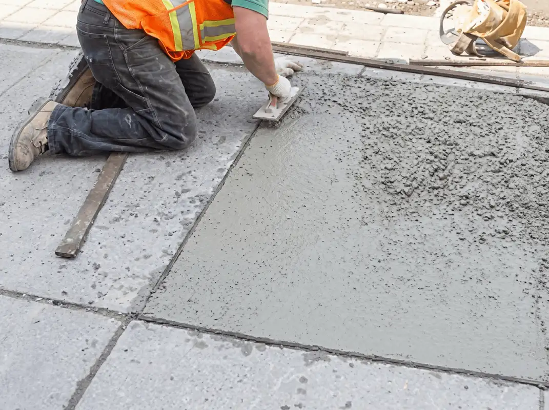 Professional repairing a concrete floor in Duluth, MN