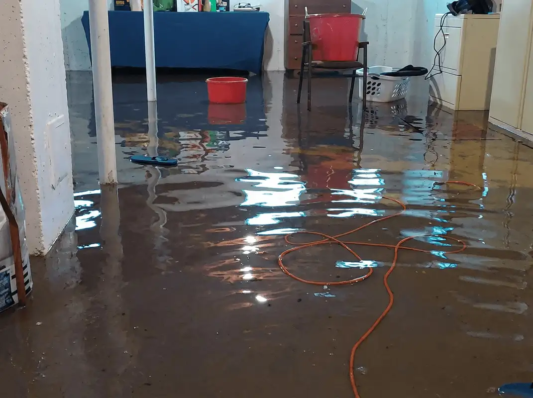 Basement with boiler, cabinets and washing machine completely flooded in Duluth, MN